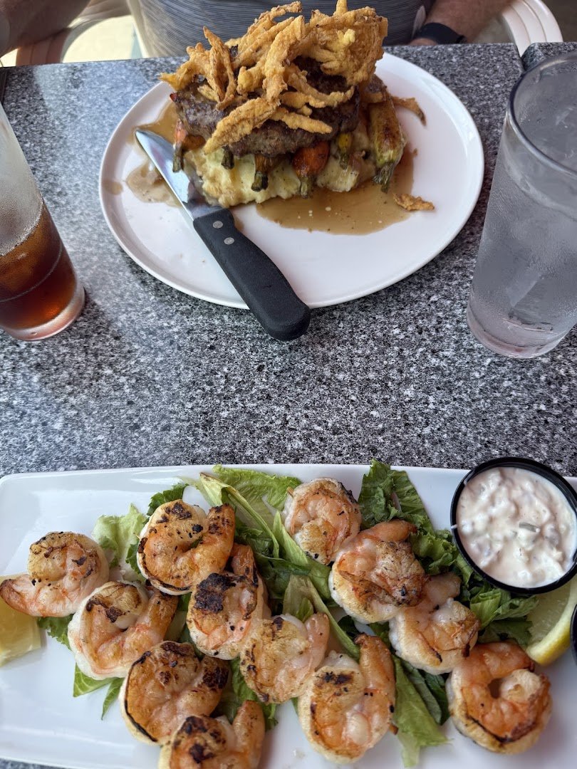 Lobster meal served in a bright dining room.